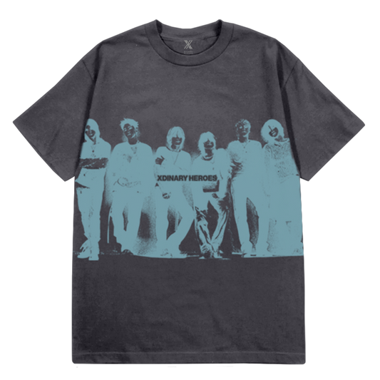 Black t-shirt with graphic design of six figures in teal on a white background