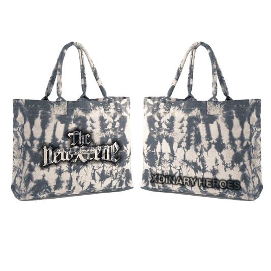 Two tie-dye tote bags with text on a white background